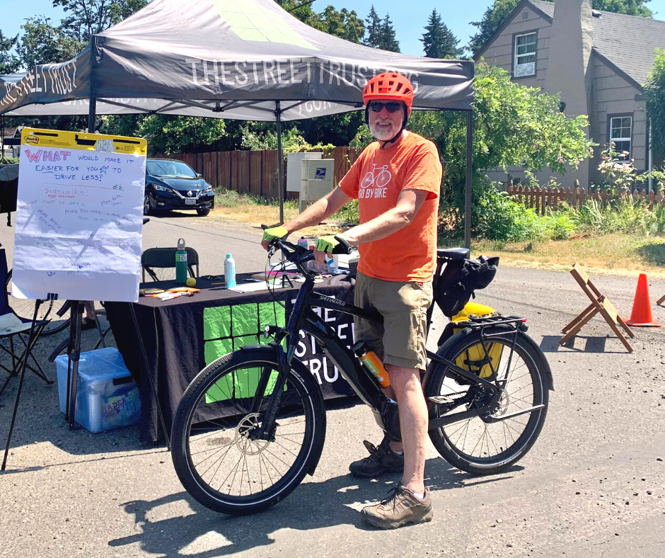 Milwaukie Mayor Mark Gamba visits The Street Trust booth at open streets event
