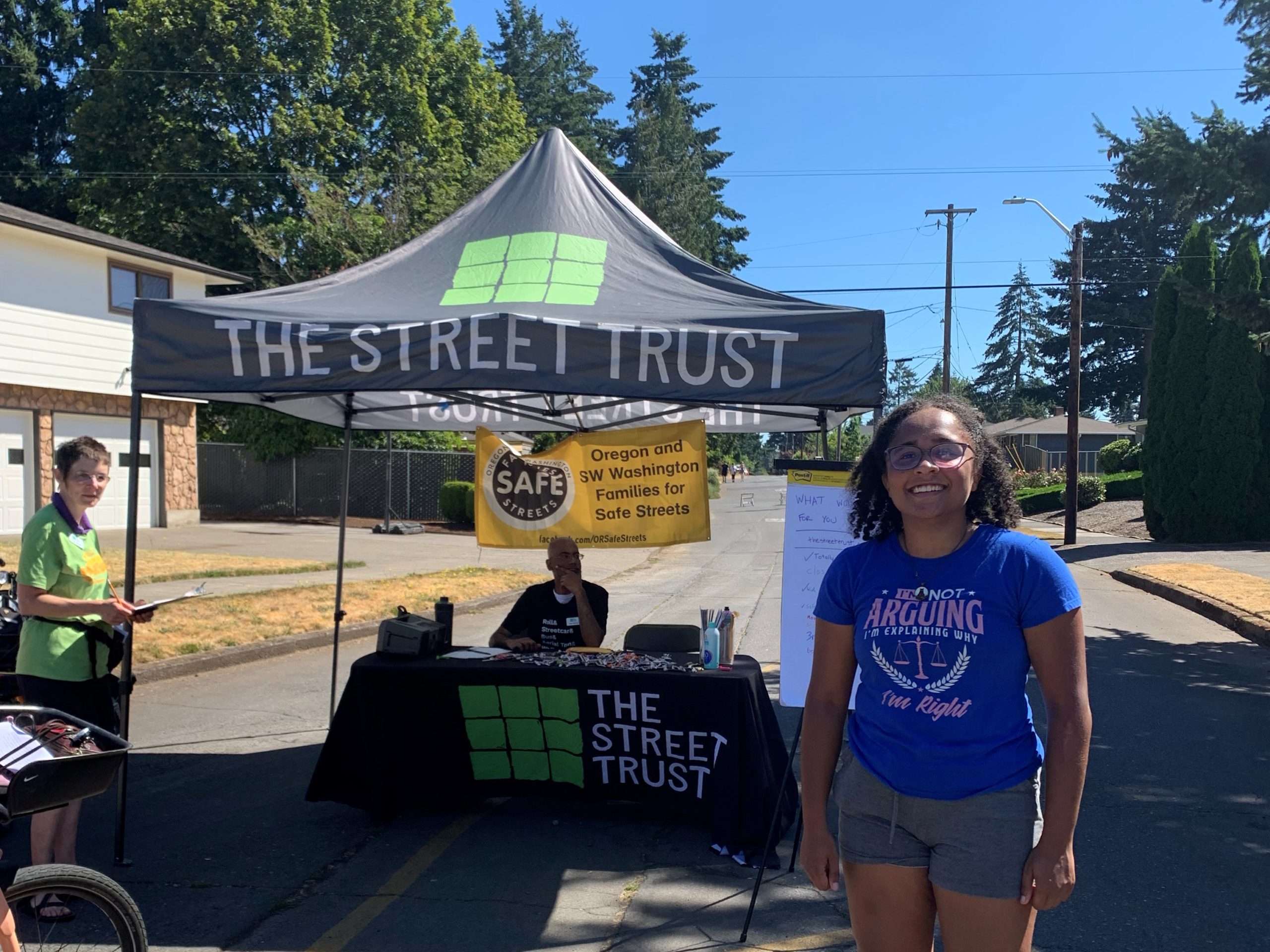 A Sunday Parkways attendee on roller skates stops by The Street Trust corner