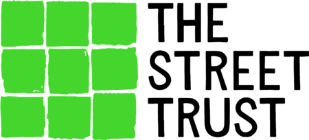 The Street Trust logo - nine high visibility green squares arranged in a square,separated by thin white lines